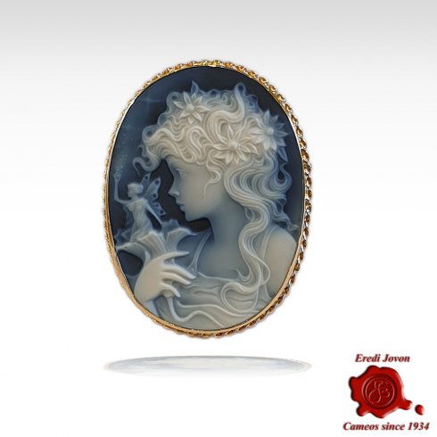 Lady with fairy blue cameo brooch gold